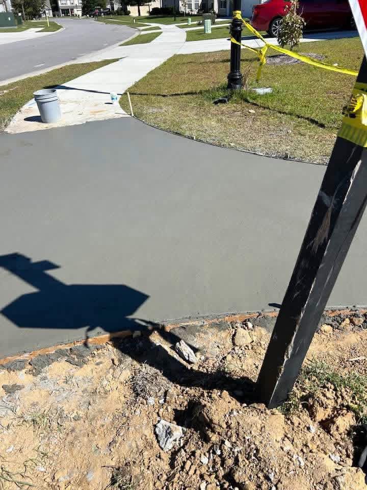 Concrete driveway apron poured and finished