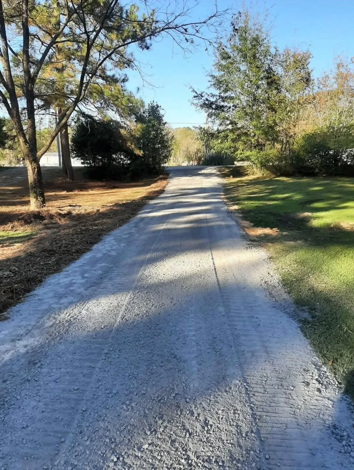 New gravel driveway built with a crown to shed water