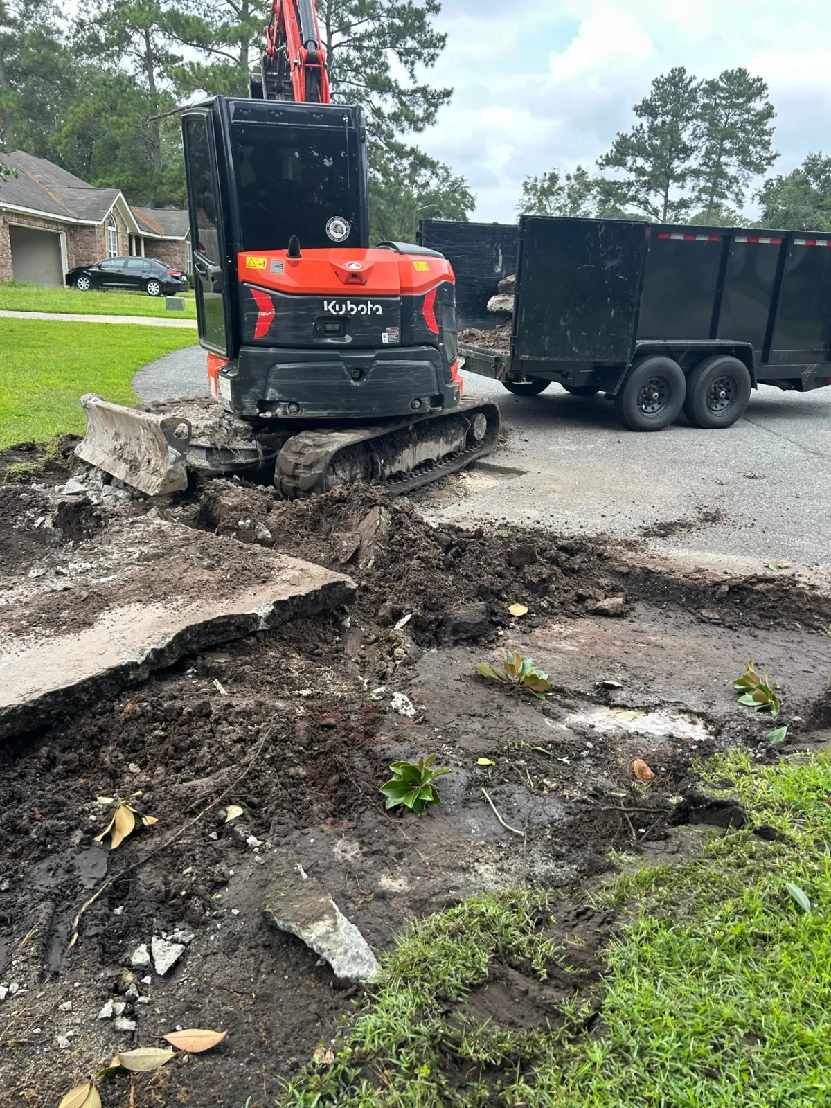 Broken slab loaded straight into the dump trailer
