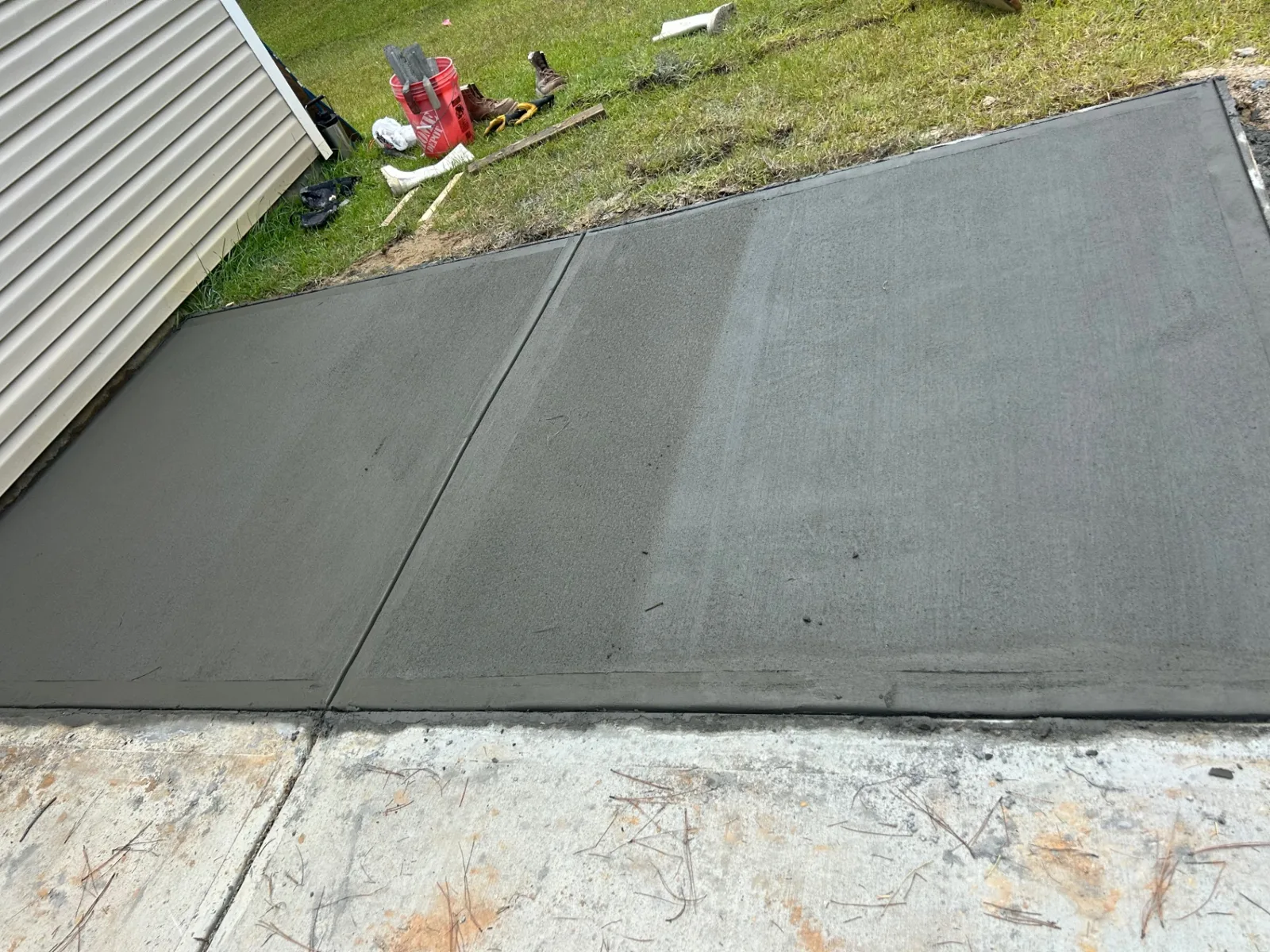 Smooth-troweled concrete walkway extension