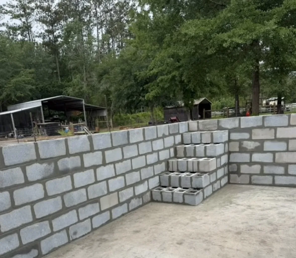 Block-work stage of an in-ground pool build